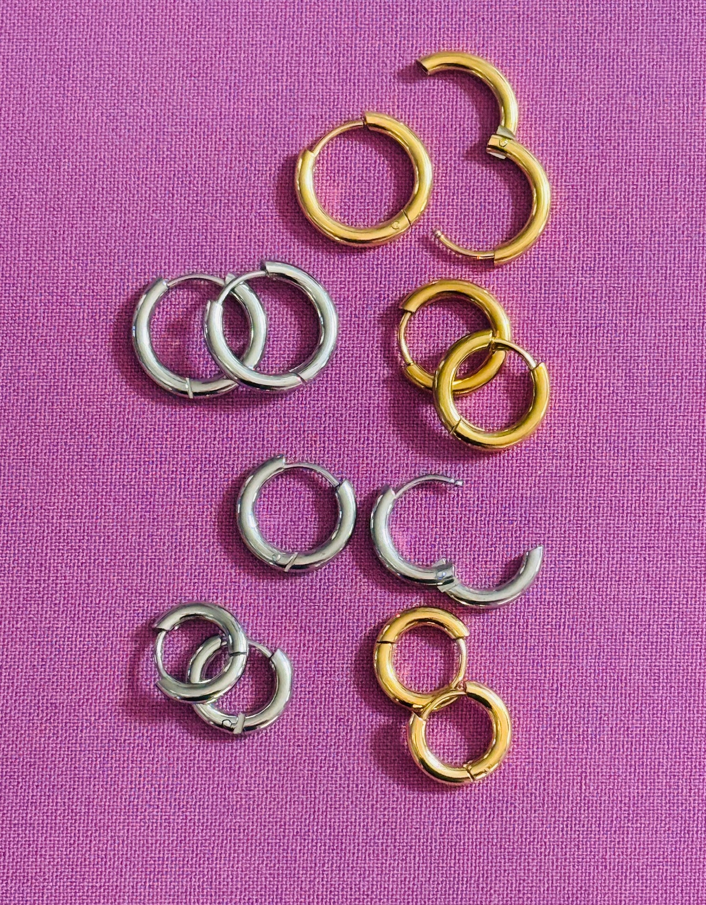 Basic infinity hoops available in silver and gold, and in 3 different sizes: 8mm, 10mm & 12 mm.