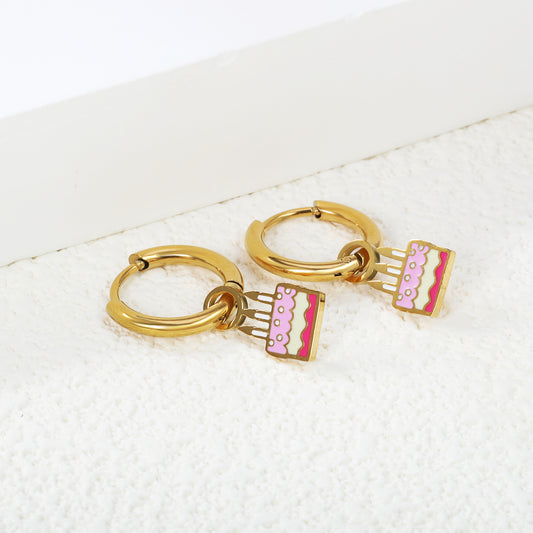 Birthday cake charm hoops on a white backdrop
