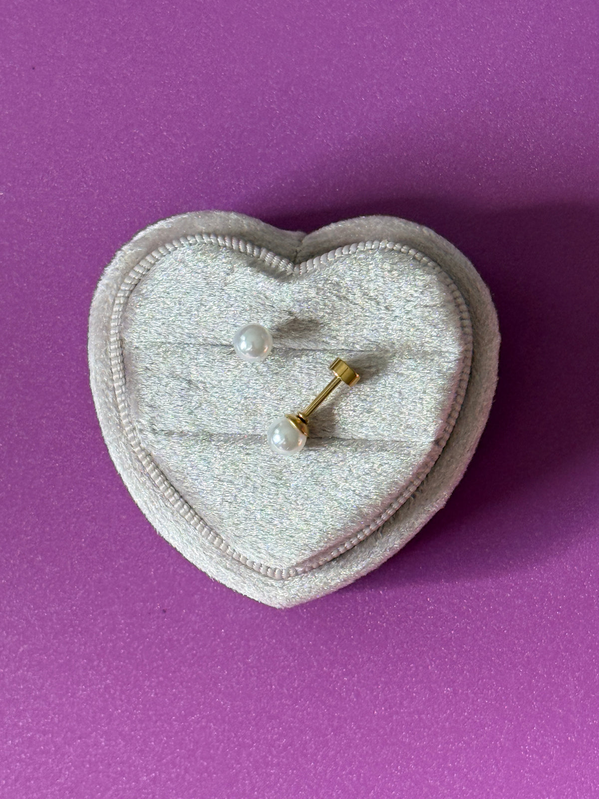 Faux pearls Screwback studs Shown on a velvet jewelry box to show size and Screwback details